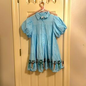 QUEEN OF SPARKLES puff sleeve blue dress with fringe flower embellishment
